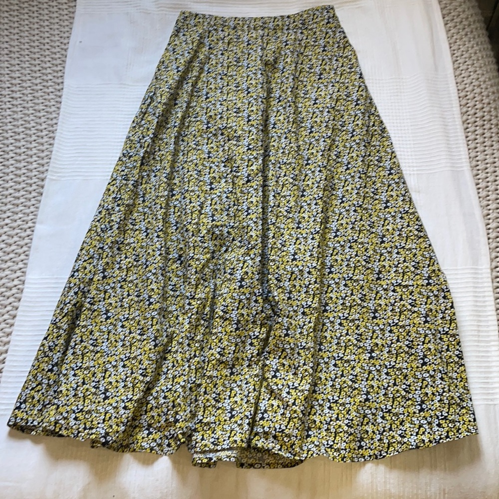 JUST yellow floral skirt.